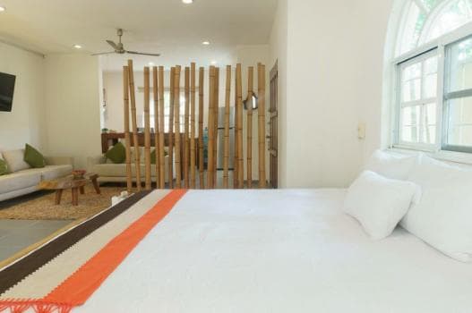 Boutique hotel-style house for sale with 3 studios and amenities in Tulum