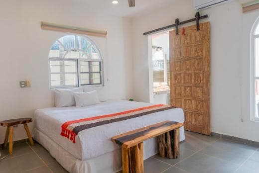 Boutique hotel-style house for sale with 3 studios and amenities in Tulum