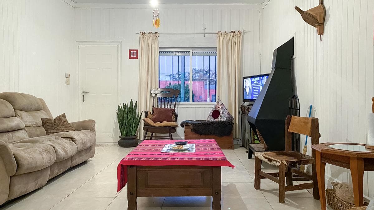 Two-bedroom house for sale with a spacious patio in San Carlos, Maldonado.