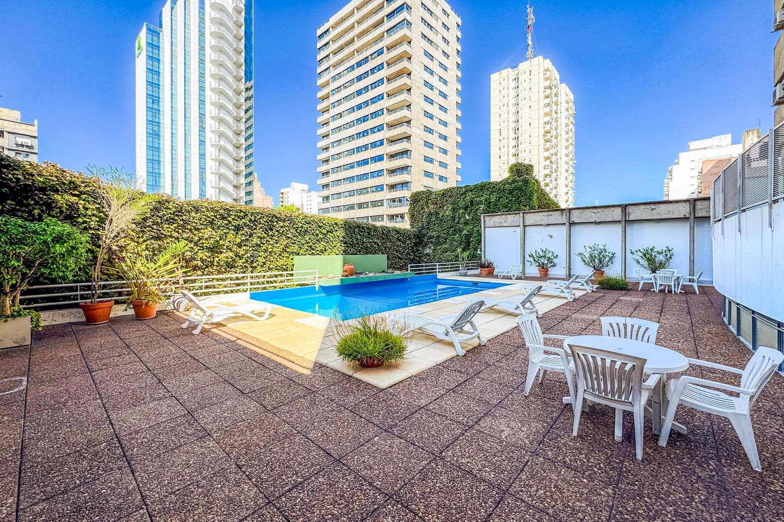 FOR SALE—2-bedroom duplex with a versatile room, private terrace, garage, and amenities. QUALIFIES FOR A LOAN