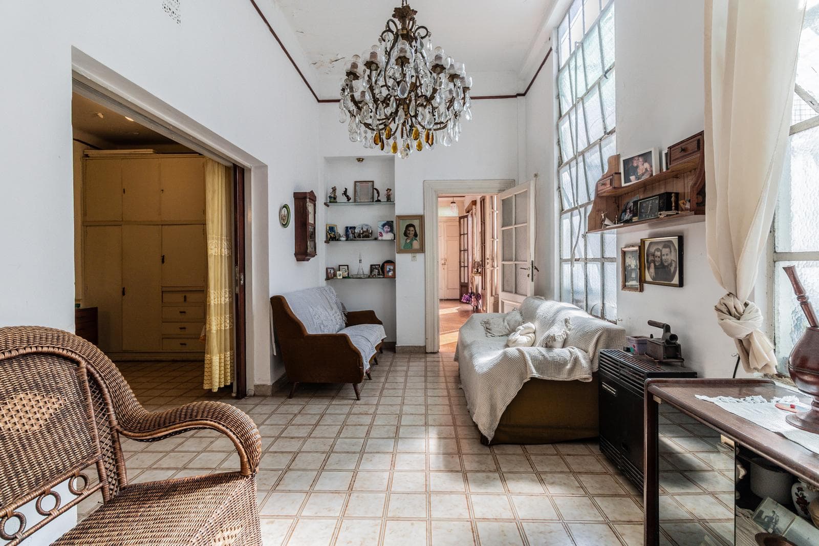 House with an apartment, plus a large storage room and parking spaces on its own lot. Excellent neighborhood!!