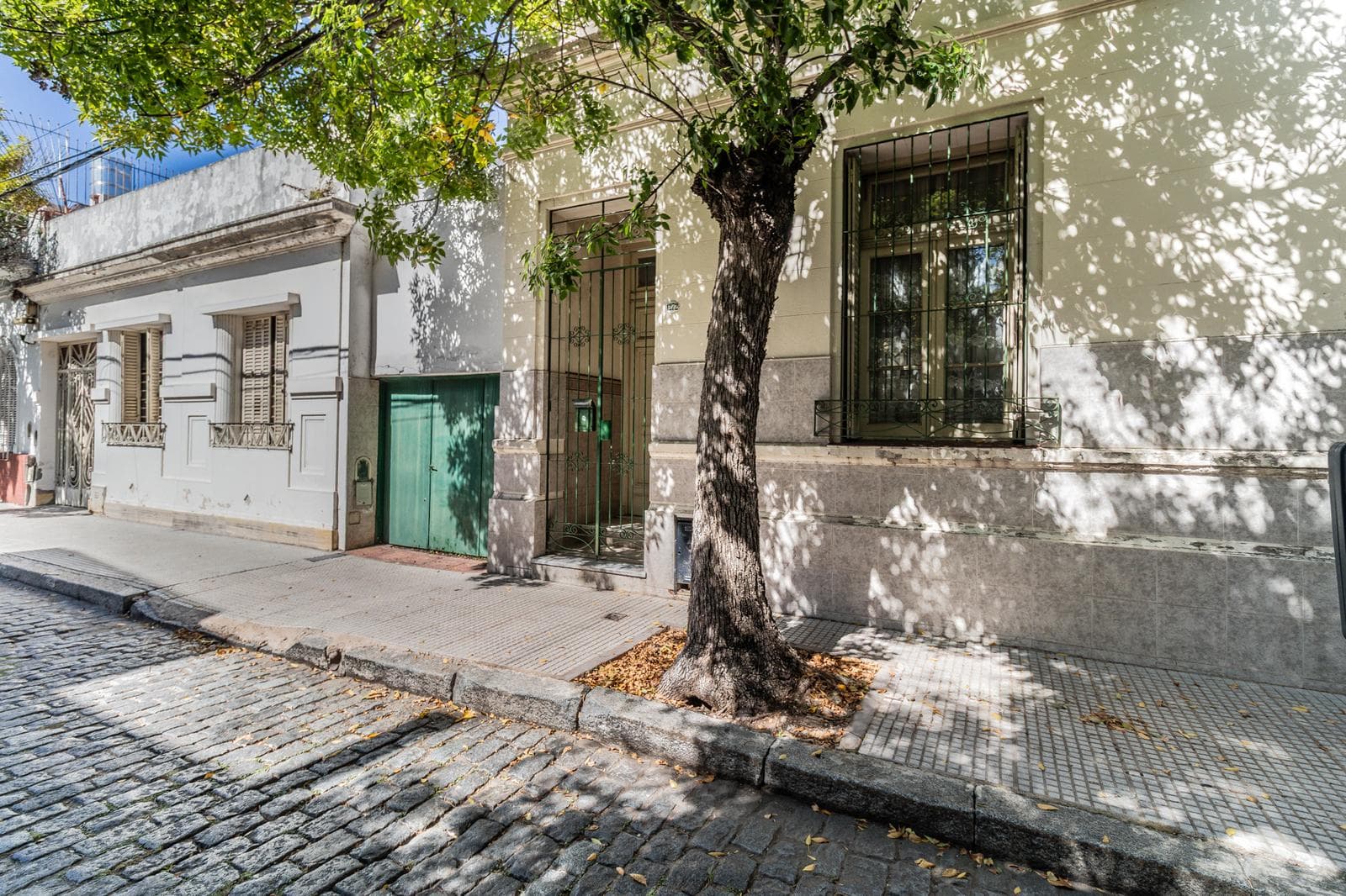 House with an apartment, plus a large storage room and parking spaces on its own lot. Excellent neighborhood!!