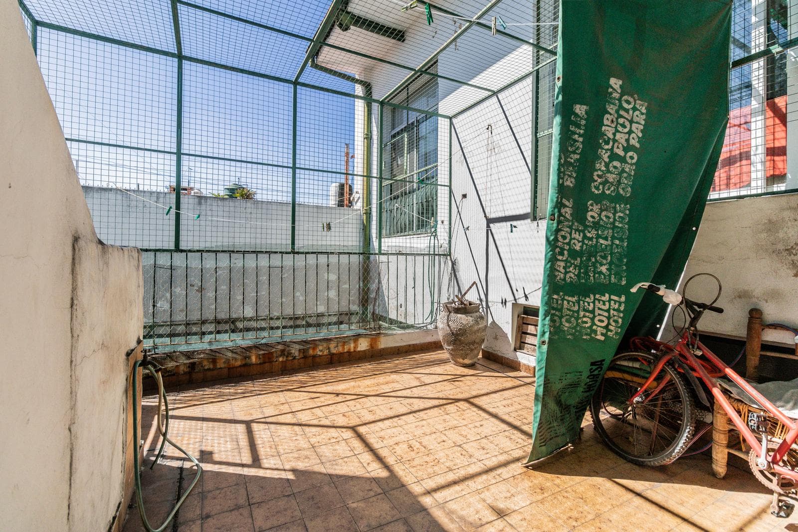 House with an apartment, plus a large storage room and parking spaces on its own lot. Excellent neighborhood!!