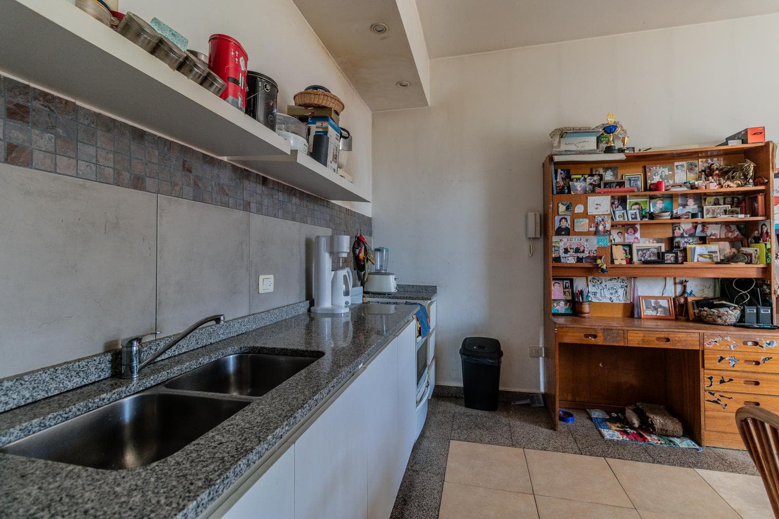 House with an apartment, plus a large storage room and parking spaces on its own lot. Excellent neighborhood!!