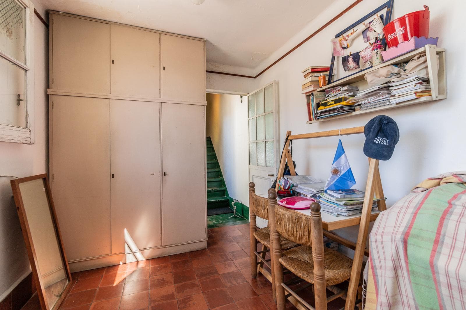 House with an apartment, plus a large storage room and parking spaces on its own lot. Excellent neighborhood!!