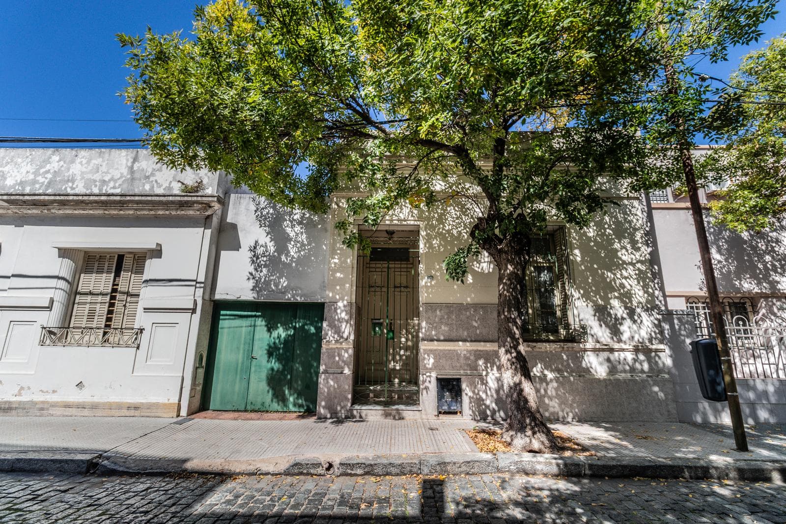 House with an apartment, plus a large storage room and parking spaces on its own lot. Excellent neighborhood!!