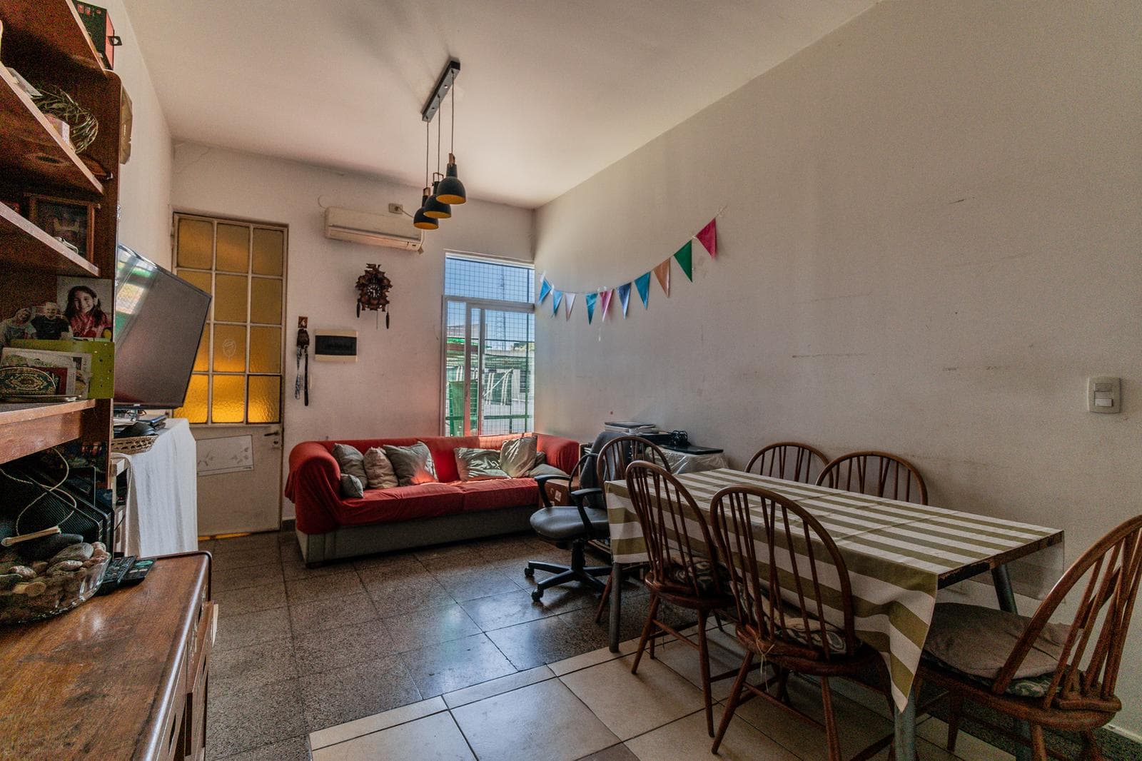 House with an apartment, plus a large storage room and parking spaces on its own lot. Excellent neighborhood!!