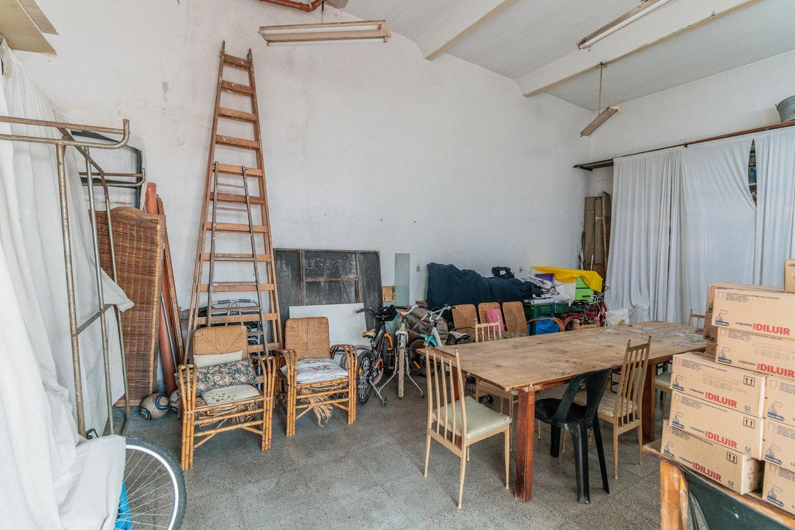 House with an apartment, plus a large storage room and parking spaces on its own lot. Excellent neighborhood!!