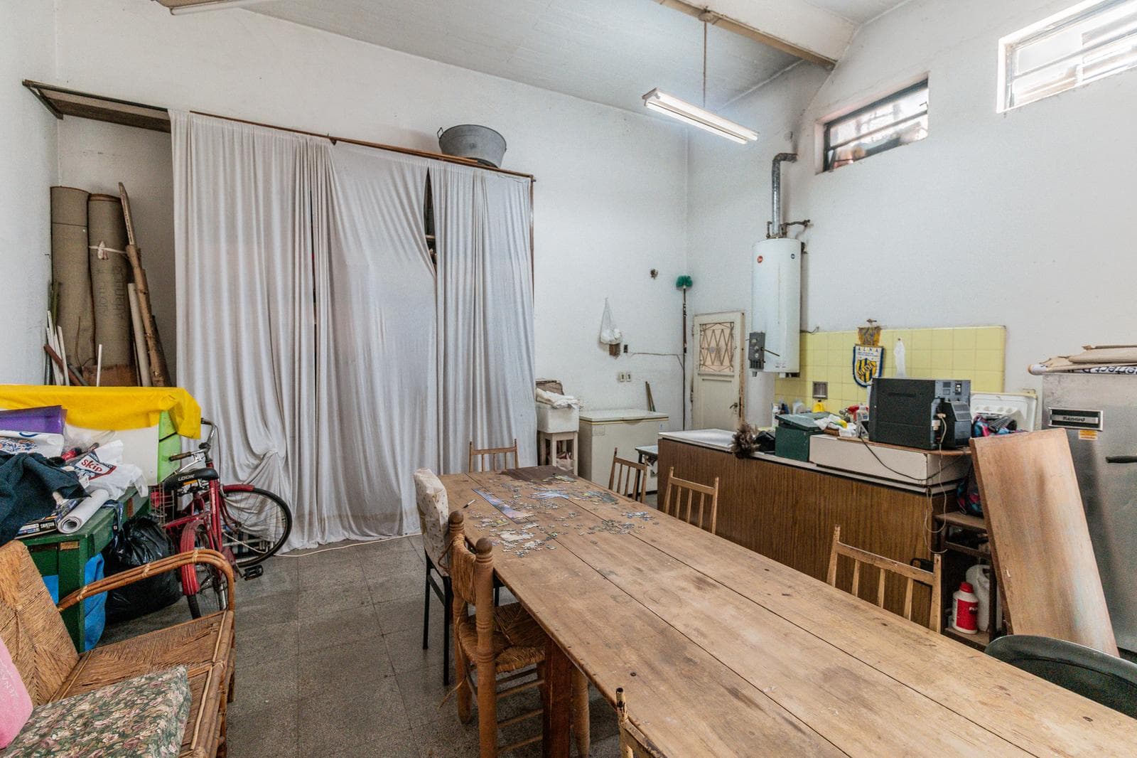 House with an apartment, plus a large storage room and parking spaces on its own lot. Excellent neighborhood!!