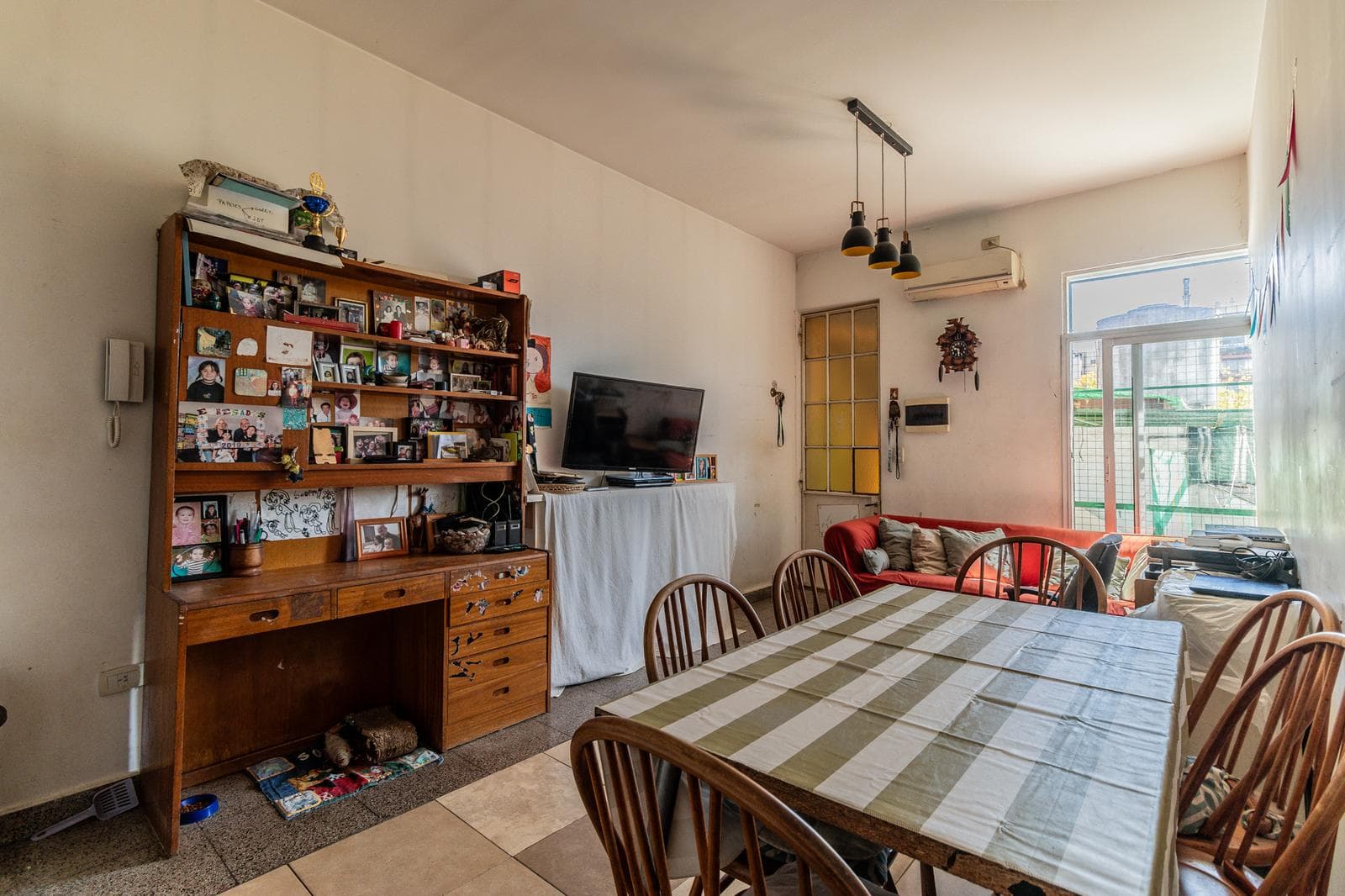 House with an apartment, plus a large storage room and parking spaces on its own lot. Excellent neighborhood!!