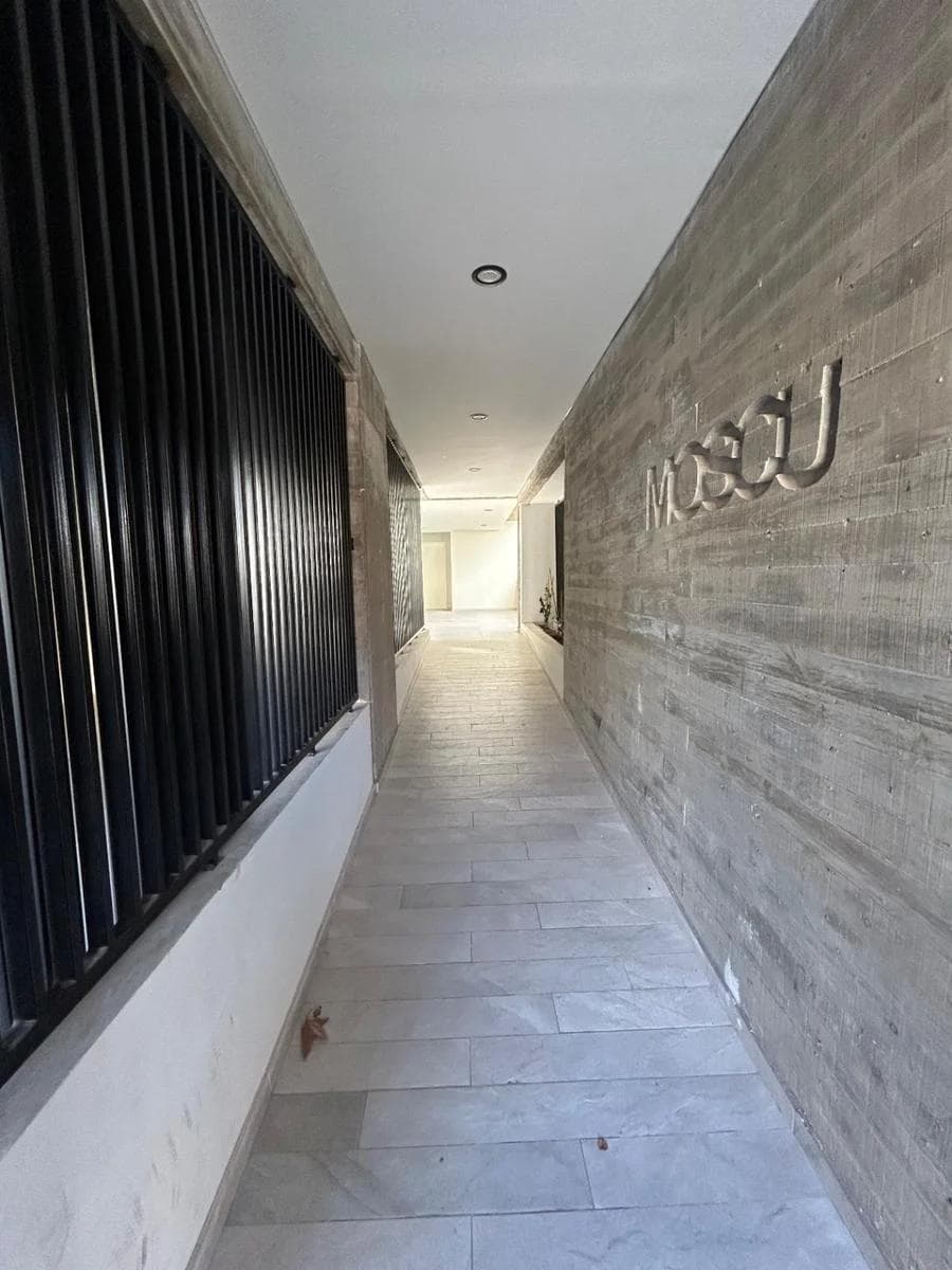 Large studio apartment with a front-facing balcony