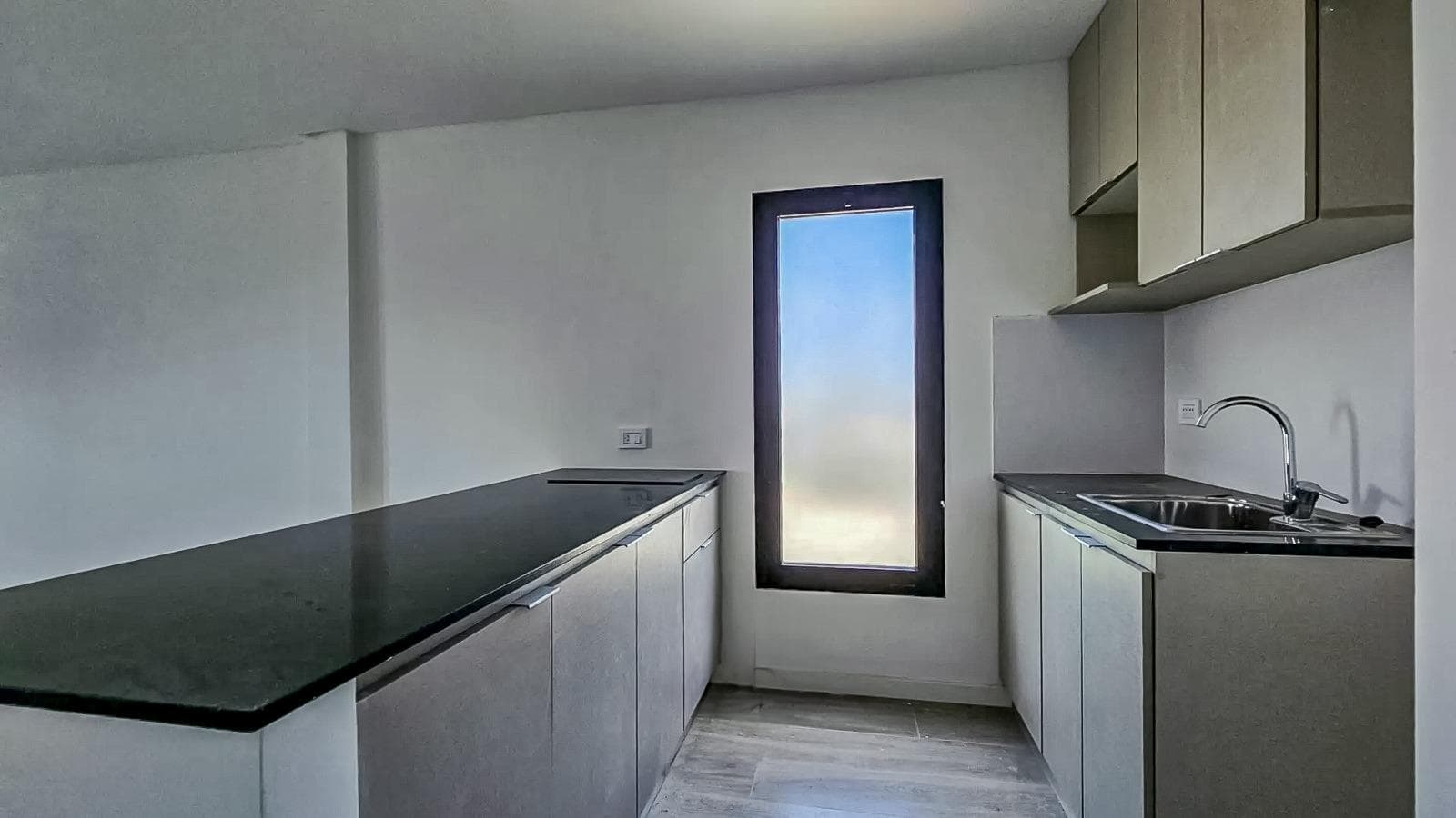 Large studio apartment with a front-facing balcony