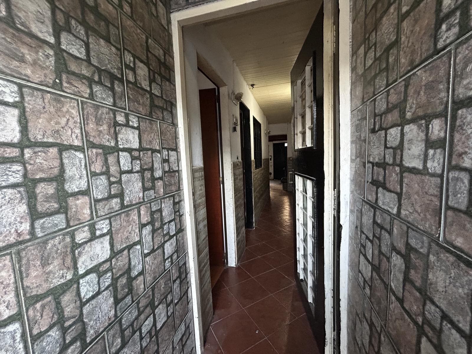 House or Building Lot in Nueva Pompeya—currently remodeled—with rental income