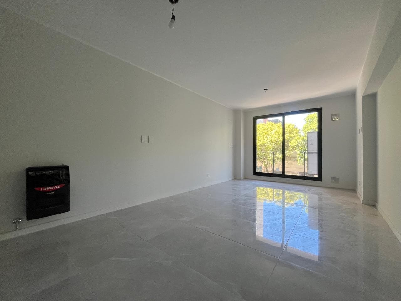 VENTA Departamento tres dormitorios con Amenities y Cochera en Martin, Rosario