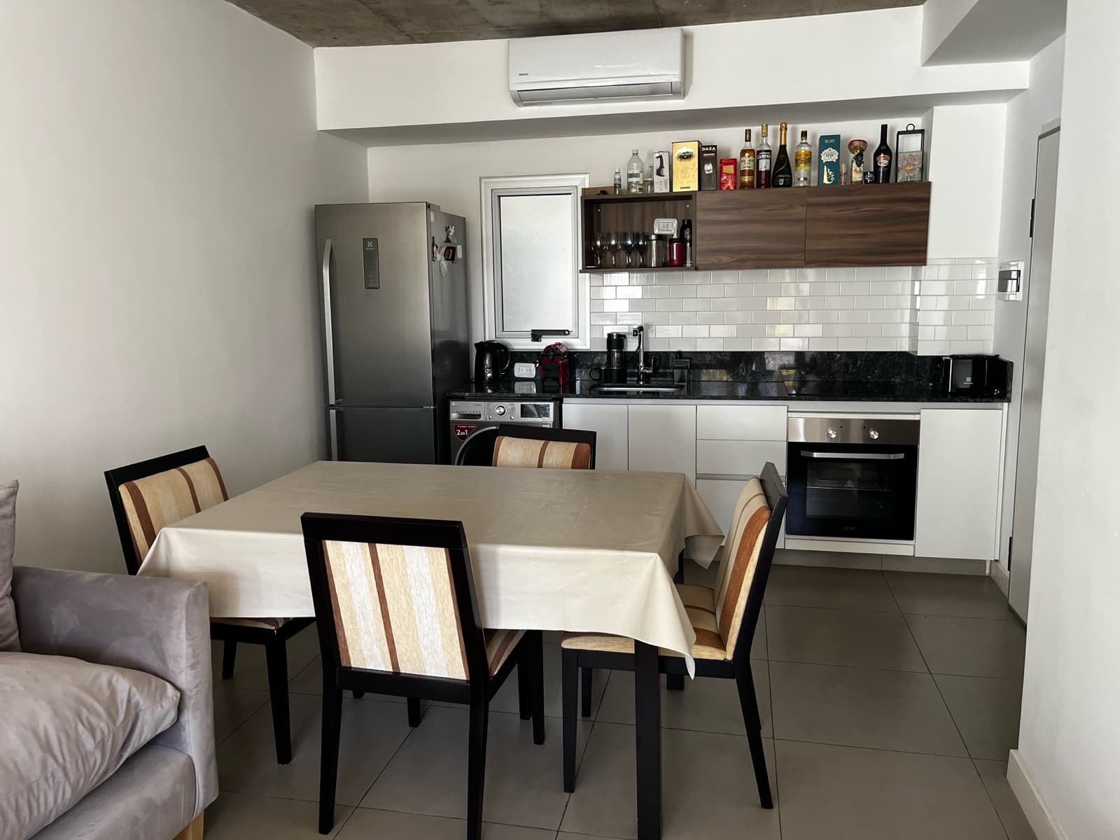 Modern studio apartment with a large patio