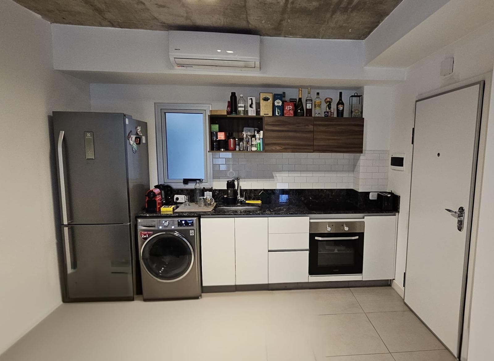Modern studio apartment with a large patio