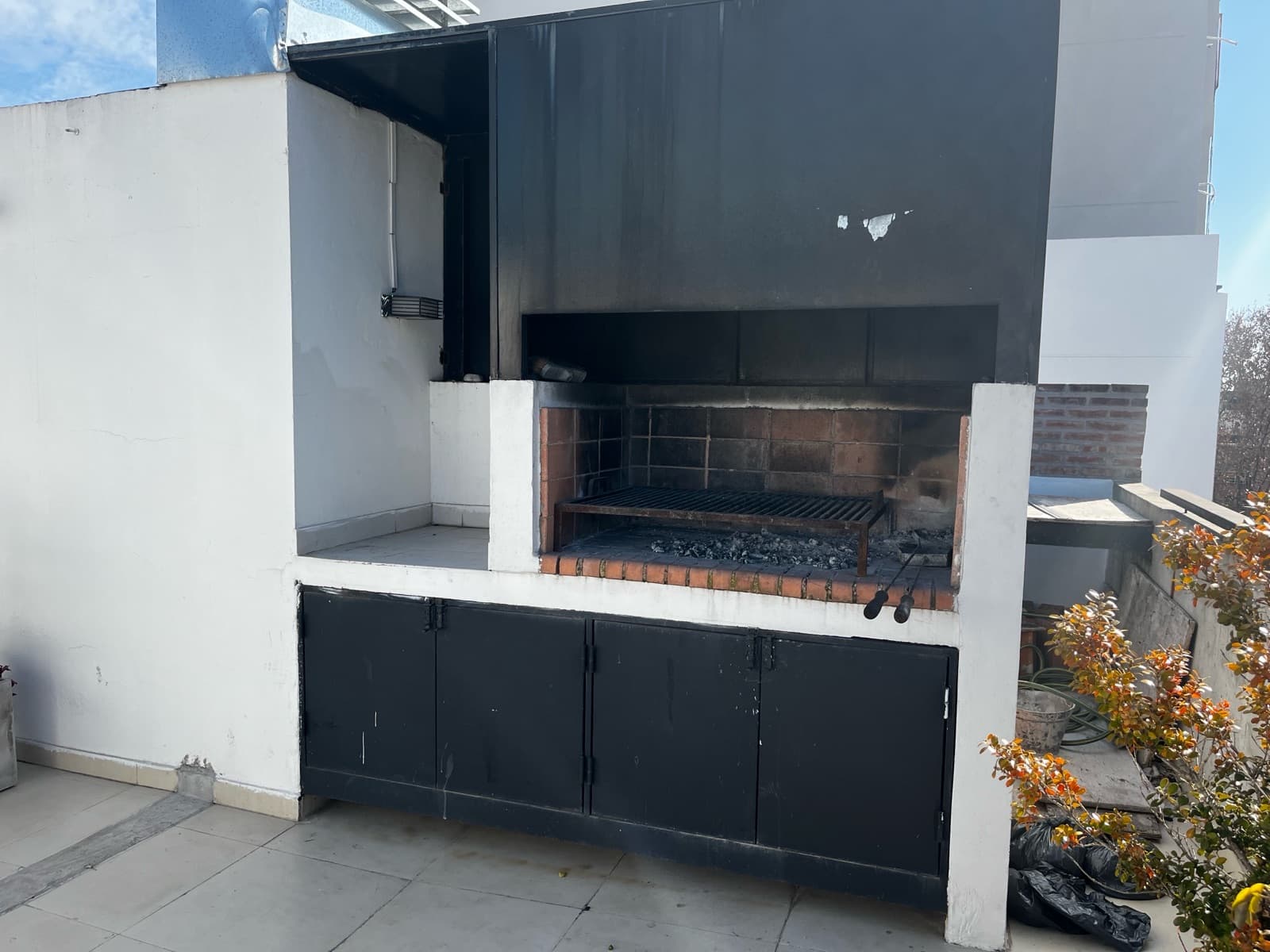 Modern studio apartment with a large patio