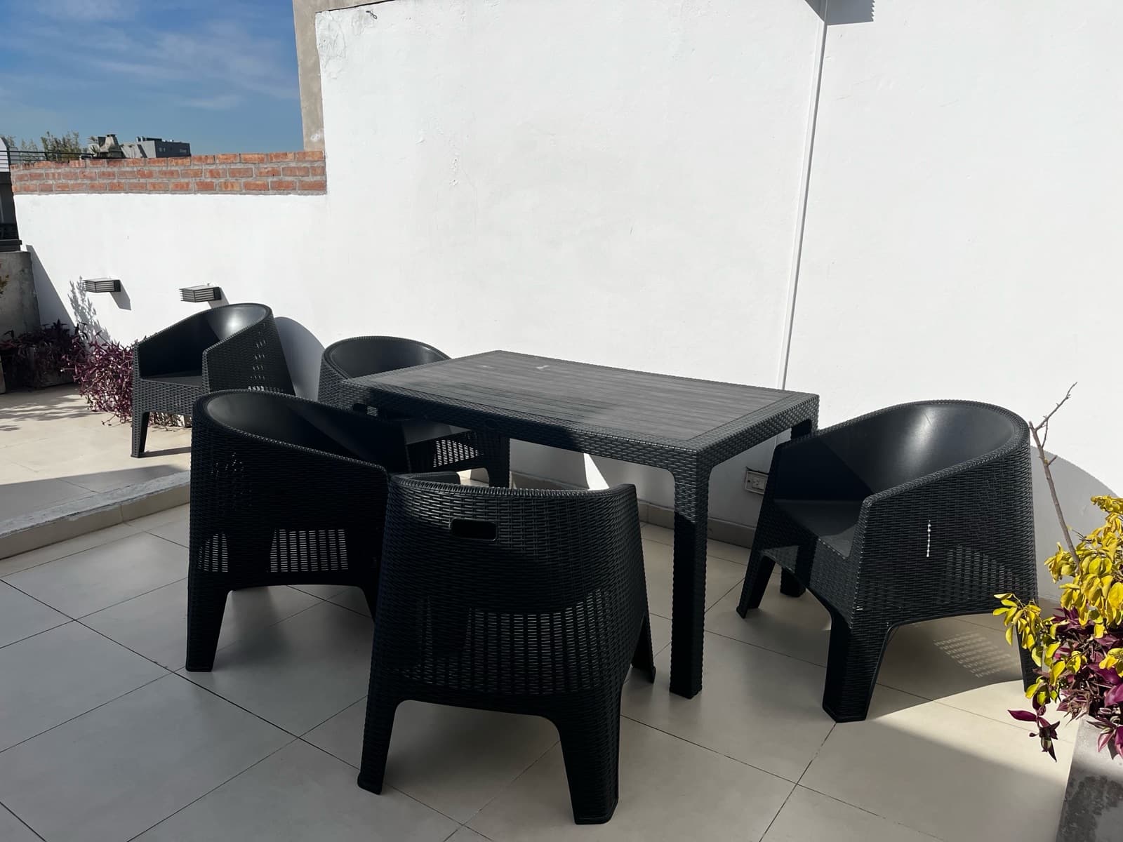 Modern studio apartment with a large patio