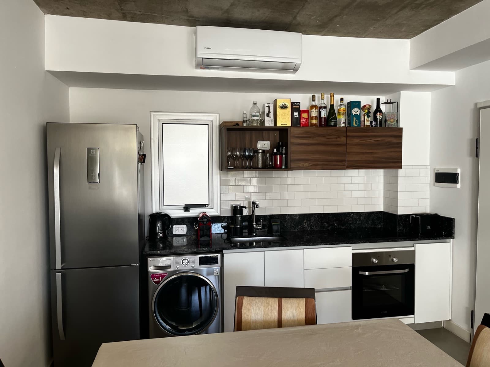 Modern studio apartment with a large patio