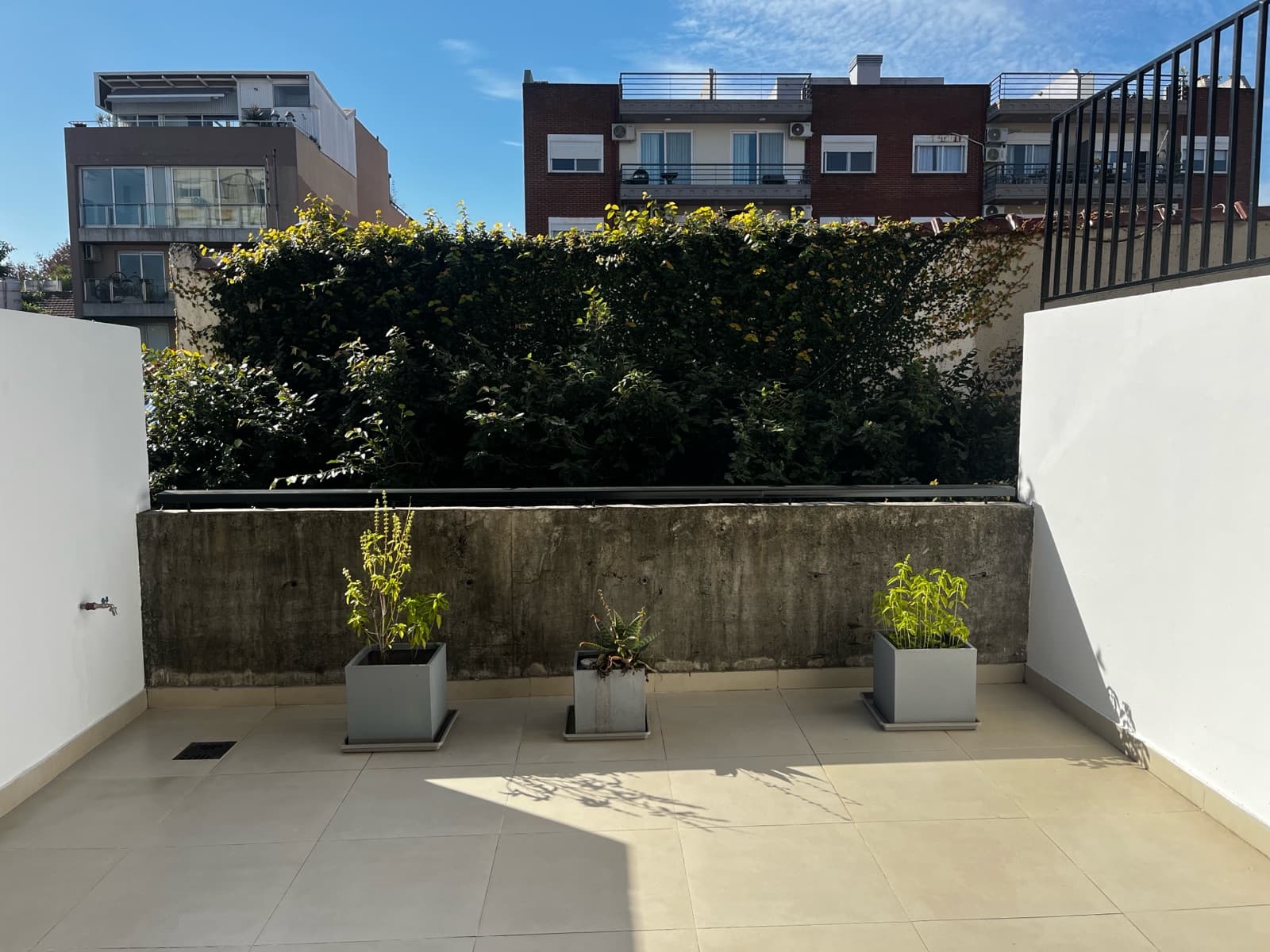 Modern studio apartment with a large patio
