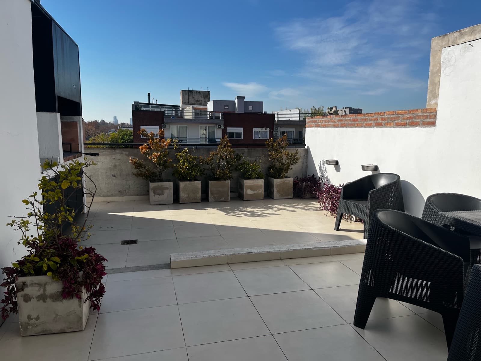 Modern studio apartment with a large patio
