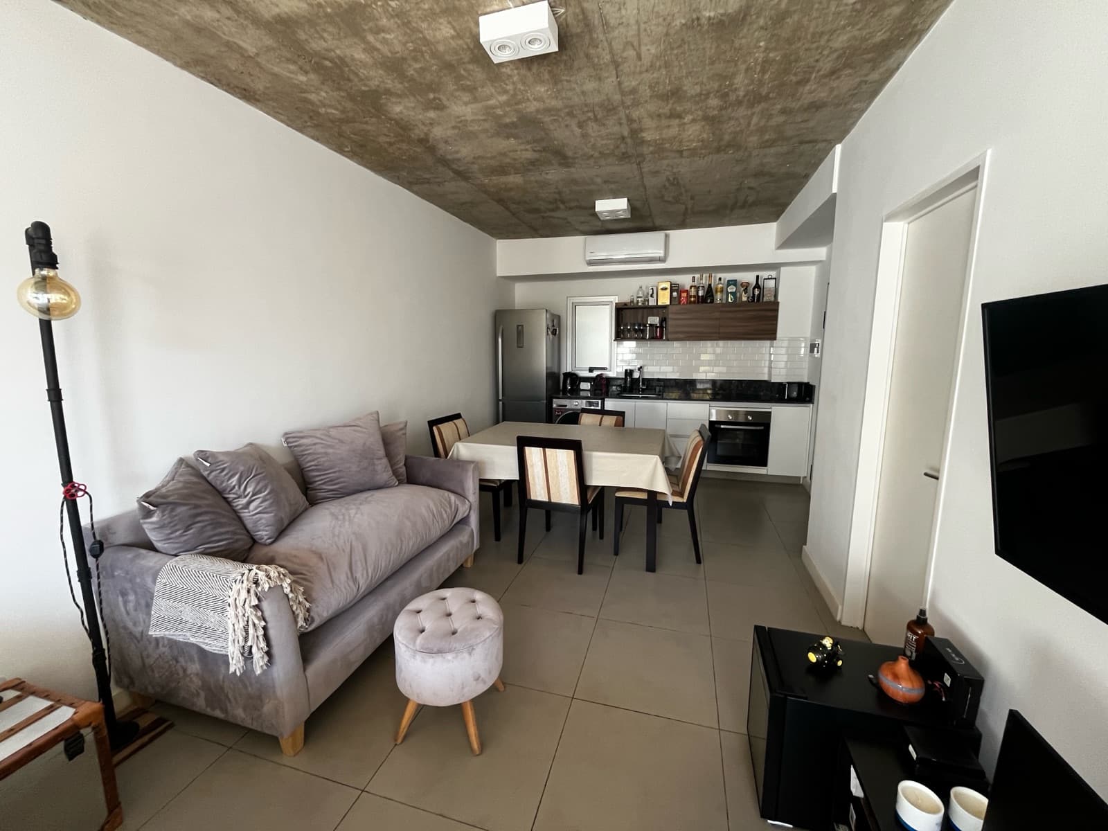 Modern studio apartment with a large patio