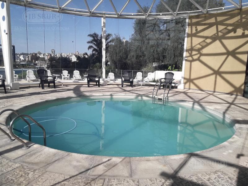 Apartment for RENT on General Paz: 3 bedrooms, 3 bathrooms, and a garage!