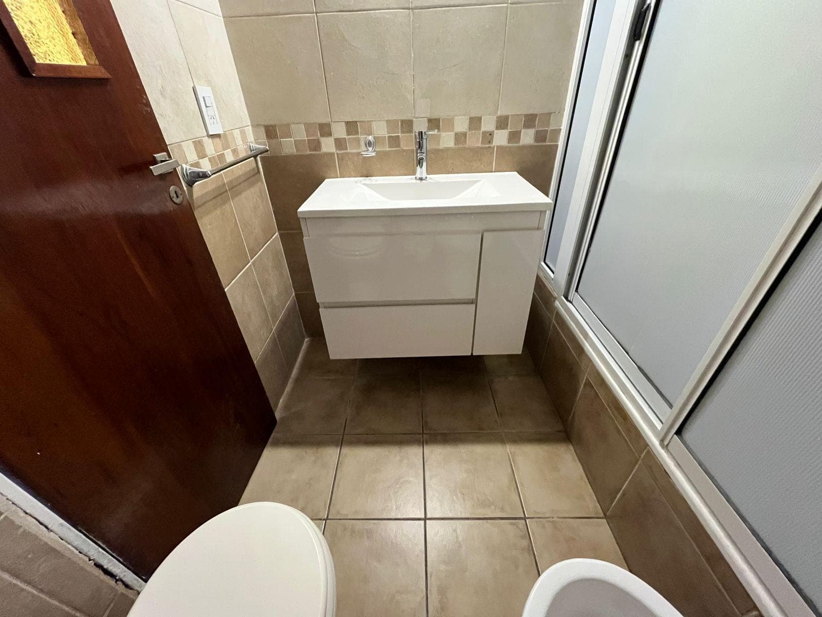 FOR SALE - 2-bedroom house with versatile room, patio with barbecue - Las Heras, Rosario. QUALIFIES FOR A MORTGAGE.
