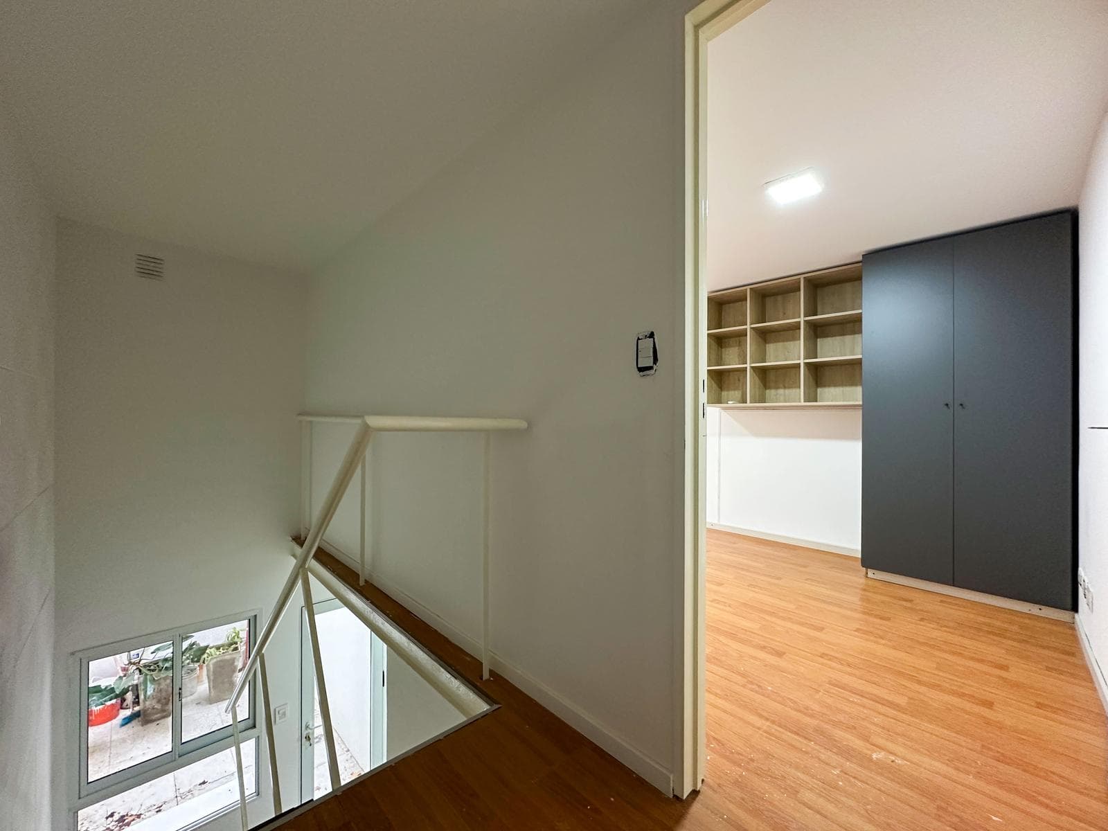 1-Bedroom Duplex Apartment with a Patio in Lourdes