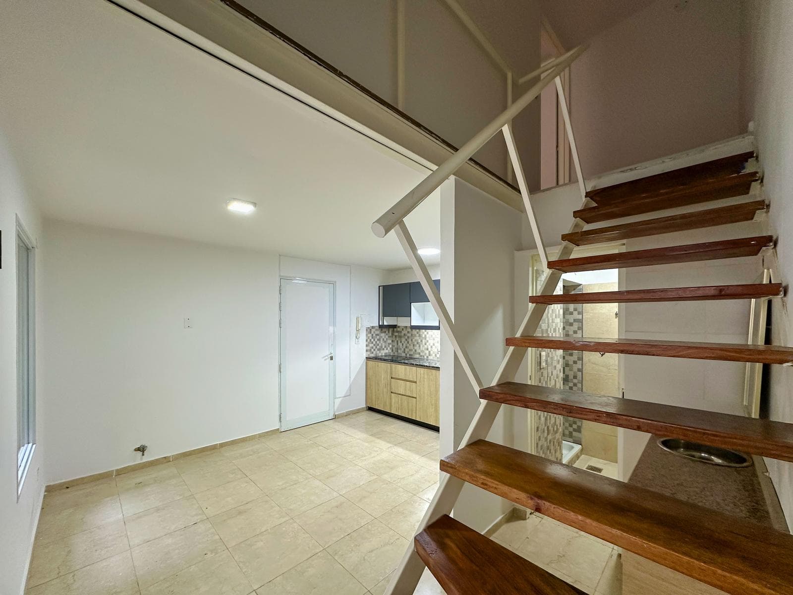 1-Bedroom Duplex Apartment with a Patio in Lourdes
