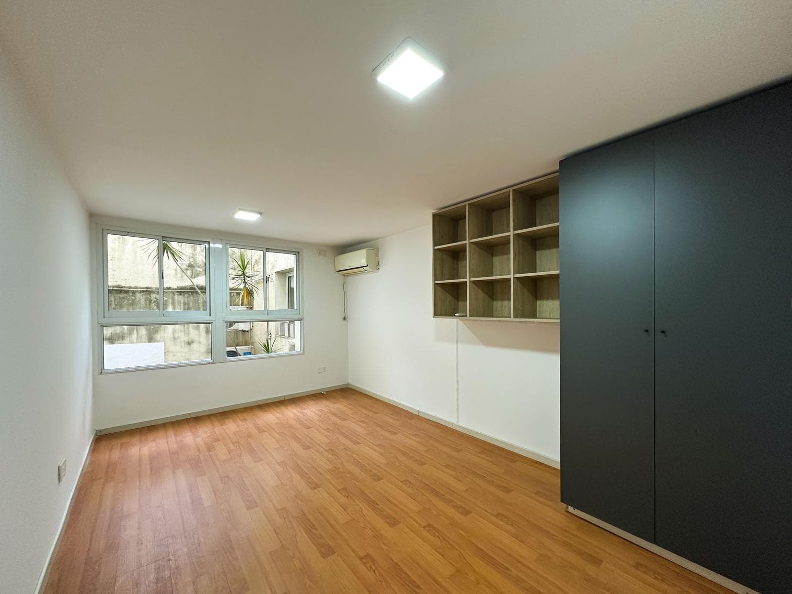 1-Bedroom Duplex Apartment with a Patio in Lourdes