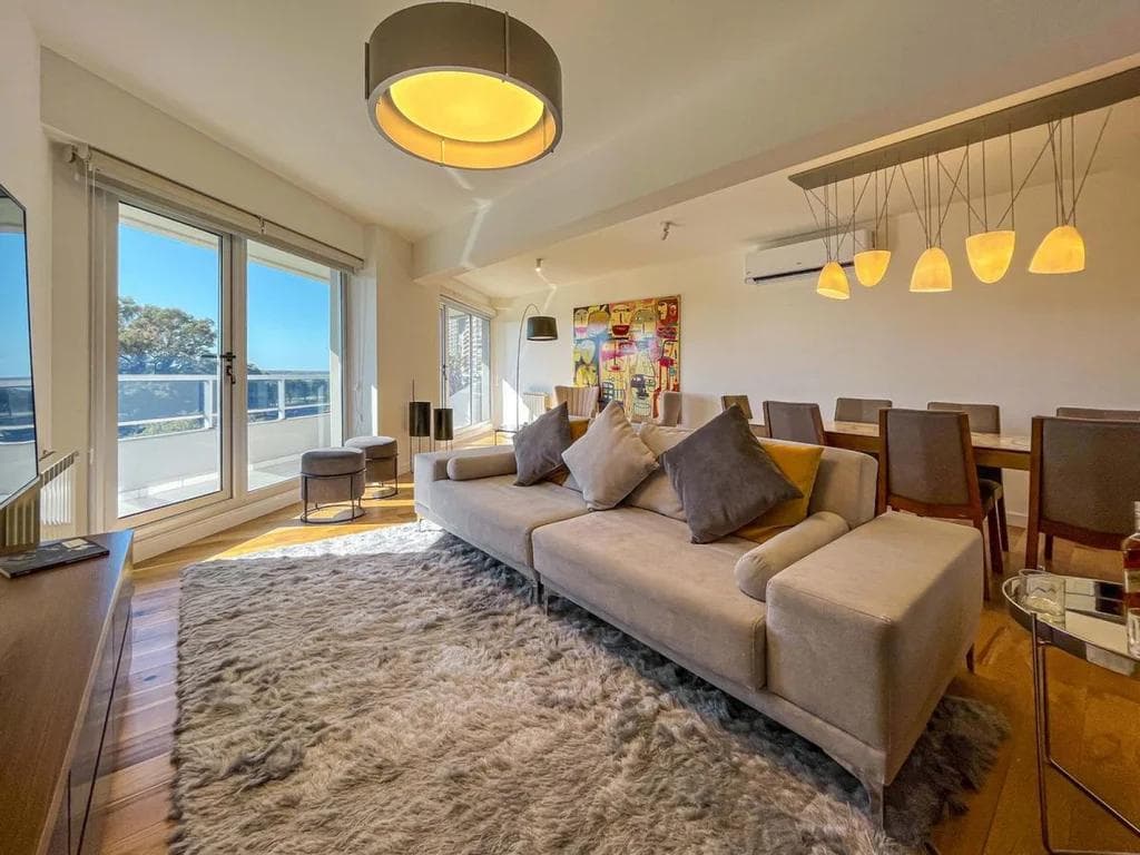 FOR SALE - 3-bedroom apartment with a view of the river. Patio and amenities. Martin, Rosario.