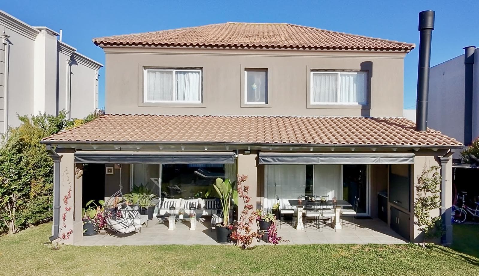 Impeccable 4-Bedroom House for Sale with Family House and Outbuilding in Nordelta, Tipas Neighborhood