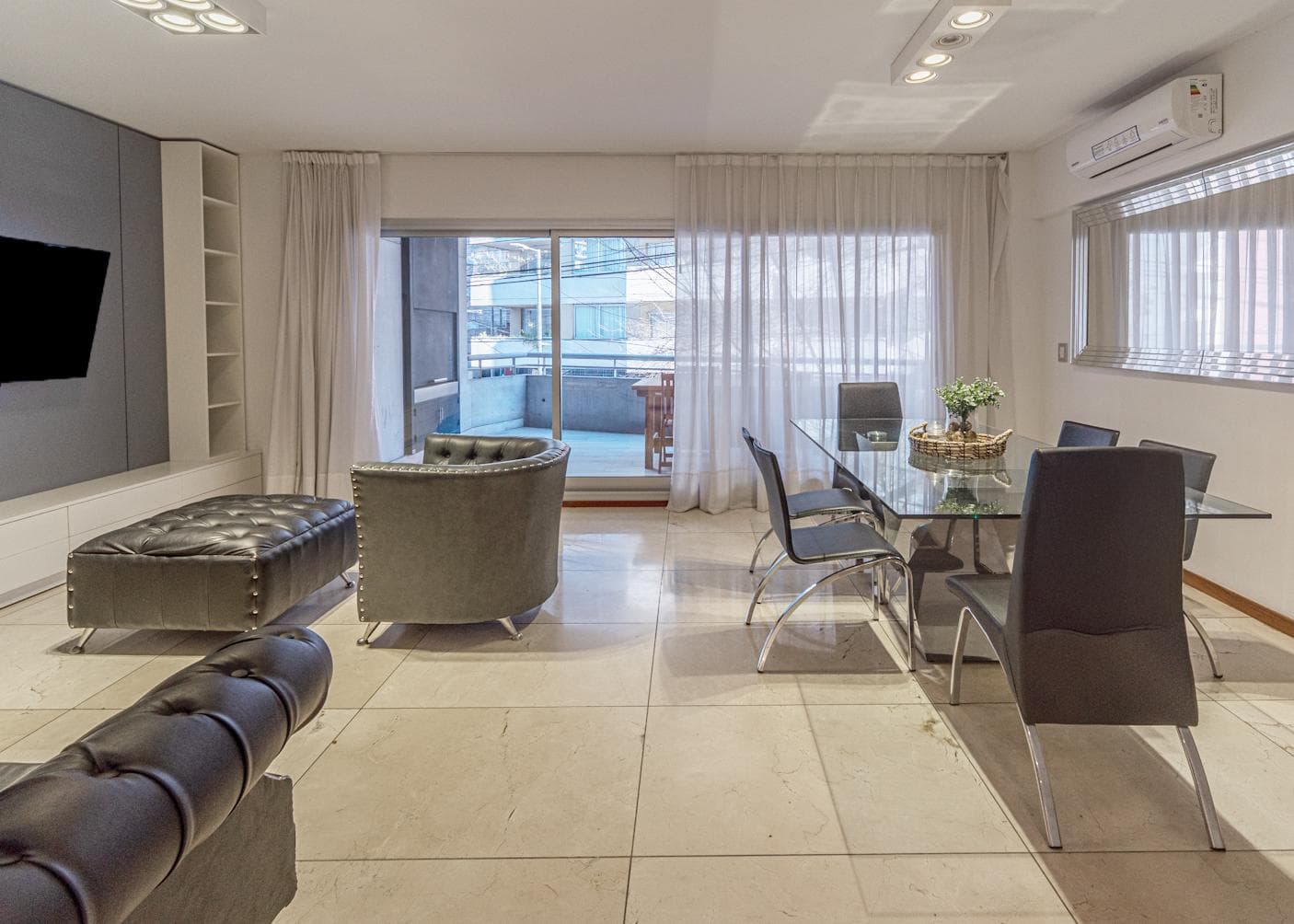 4-room apartment for sale in Belgrano with a balcony featuring a barbecue. Private patio