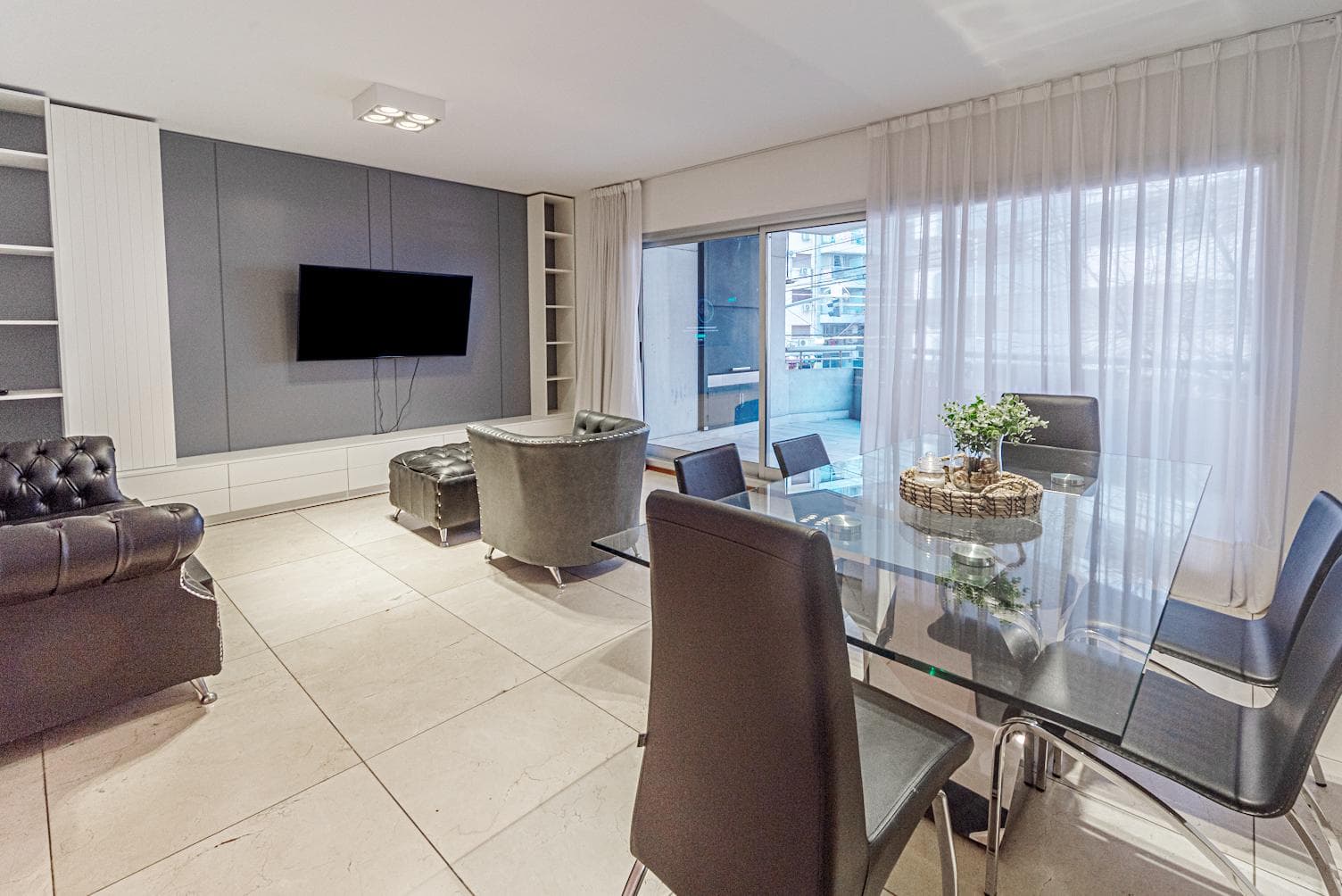 4-room apartment for sale in Belgrano with a balcony featuring a barbecue. Private patio