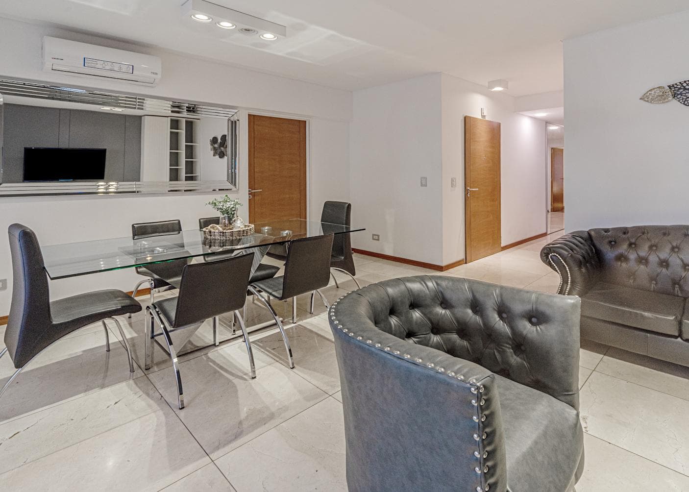 4-room apartment for sale in Belgrano with a balcony featuring a barbecue. Private patio