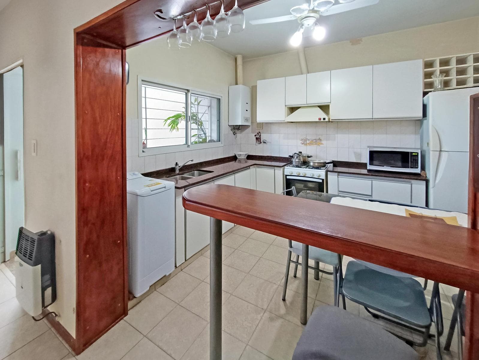 FOR SALE | TRADE - 4-bedroom house with barbecue area and garage - Sarmiento neighborhood, Rosario.