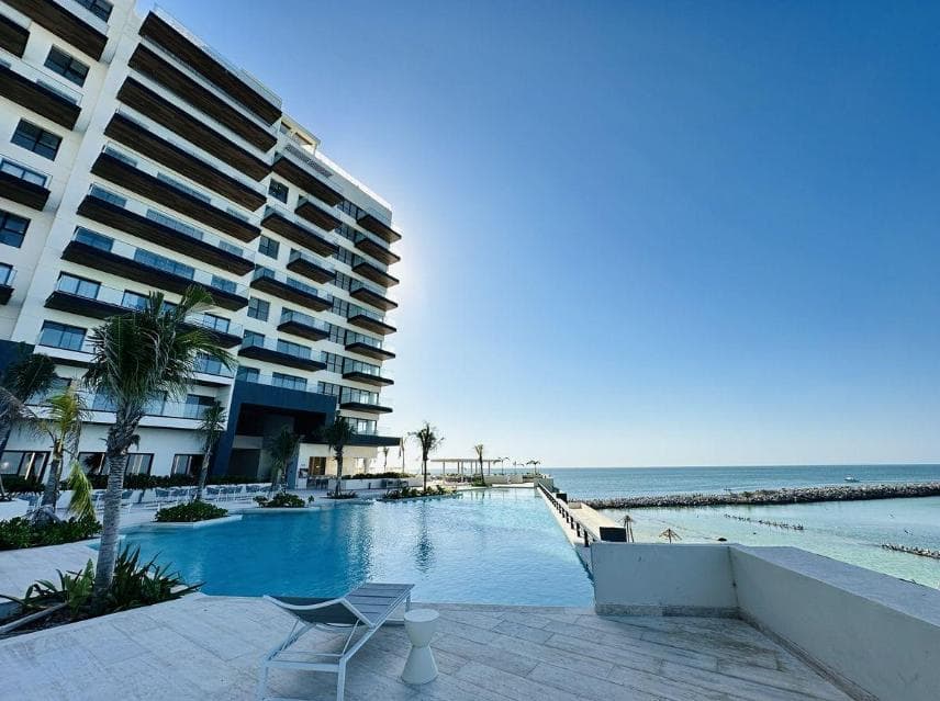 Beachfront apartment for sale (furnished)* in Yucalpetén