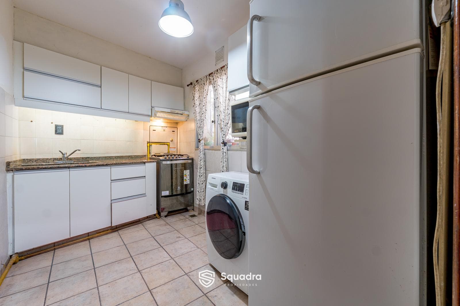 FOR SALE - Two-bedroom row house with a patio. Lourdes, Rosario. QUALIFIES FOR A MORTGAGE.