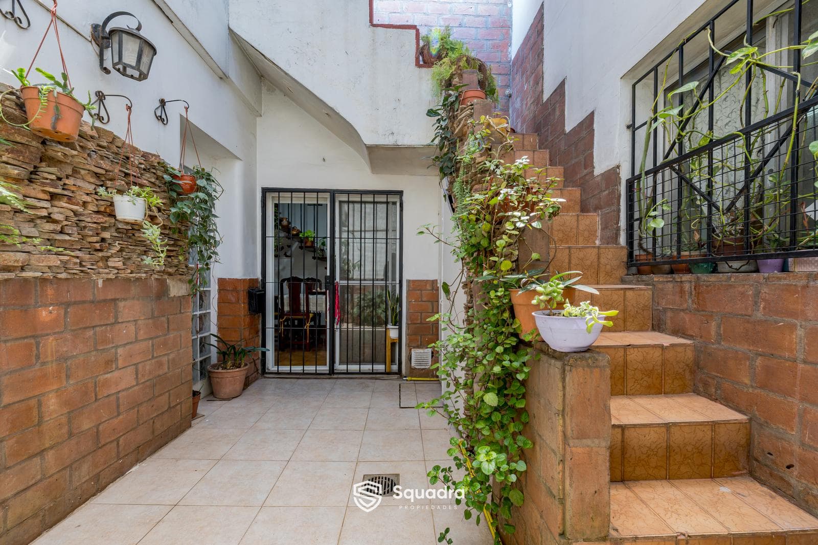 FOR SALE - Two-bedroom row house with a patio. Lourdes, Rosario. QUALIFIES FOR A MORTGAGE.