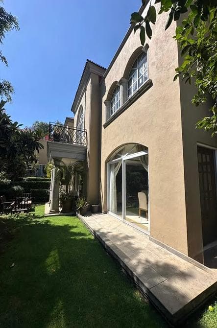 Condominium unit for sale in Bosques de las Lomas, with a garden, security, and service fee