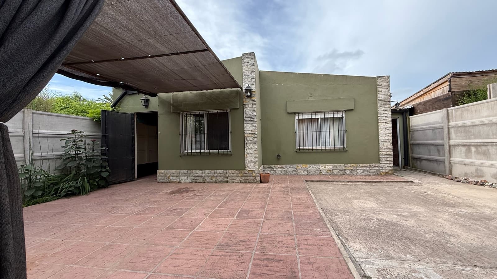 A beautiful home with a charming, lush garden where moments become unforgettable