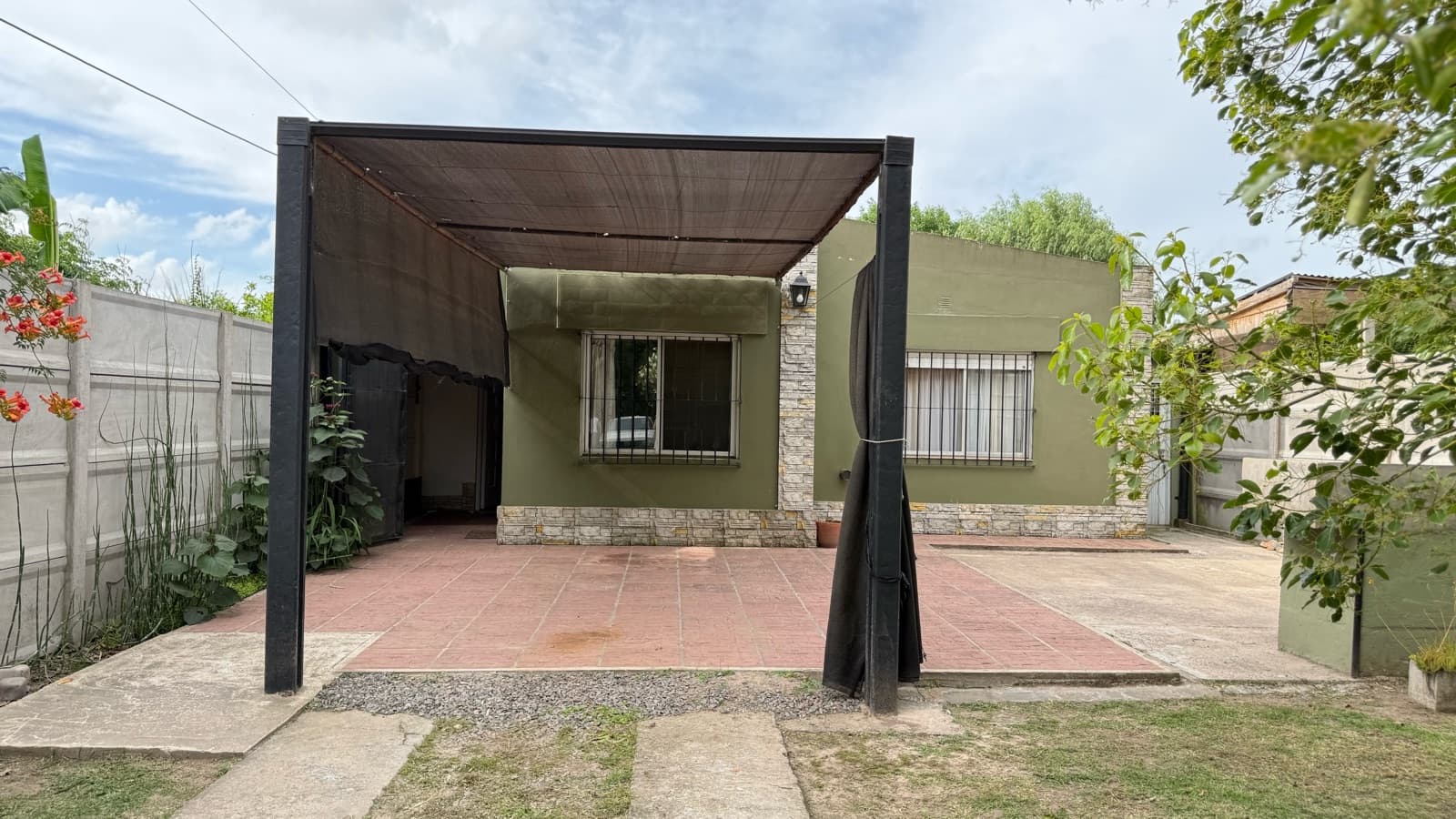 A beautiful home with a charming, lush garden where moments become unforgettable