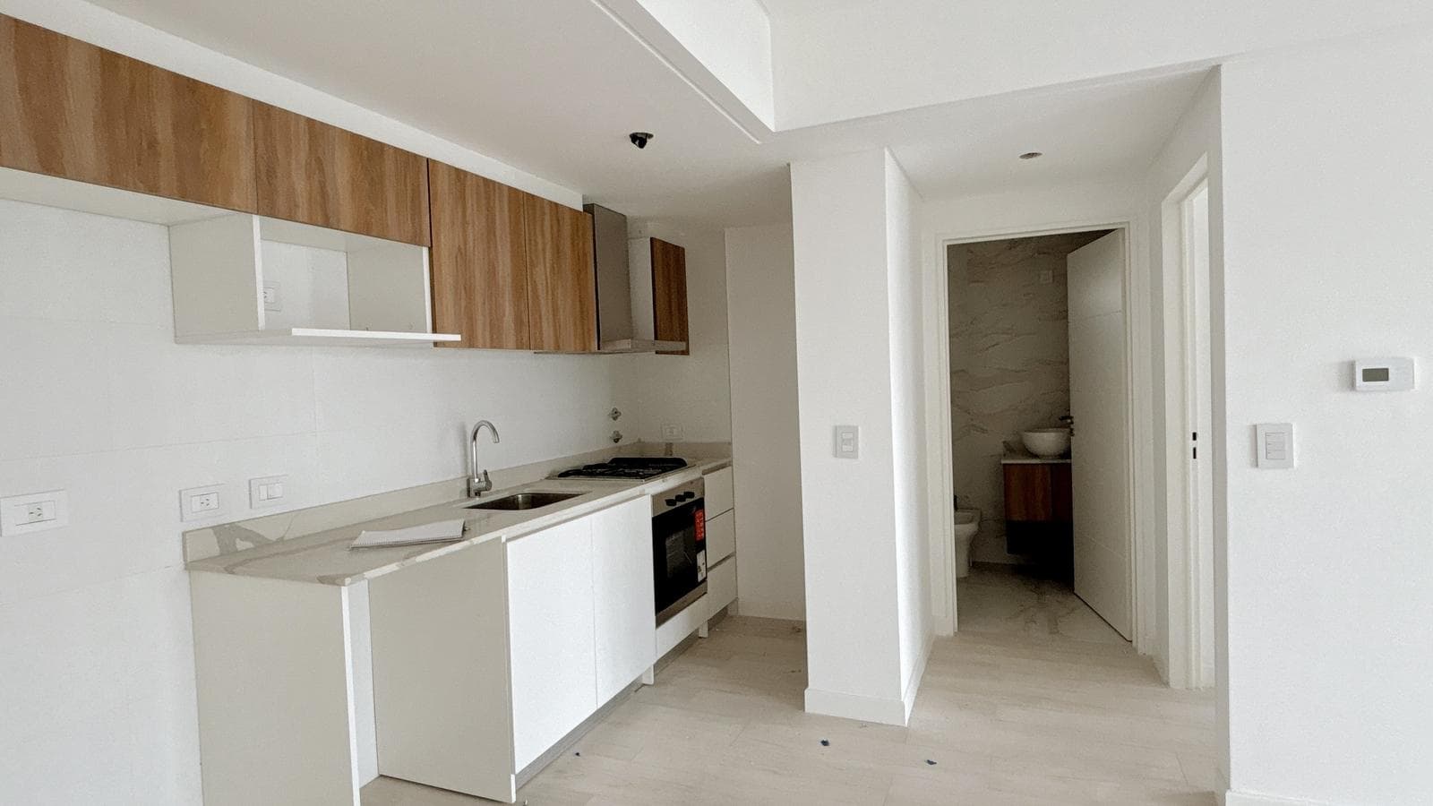 Brand-new 2-room apartment with amenities and low maintenance fees in Nuñez. High-end building.