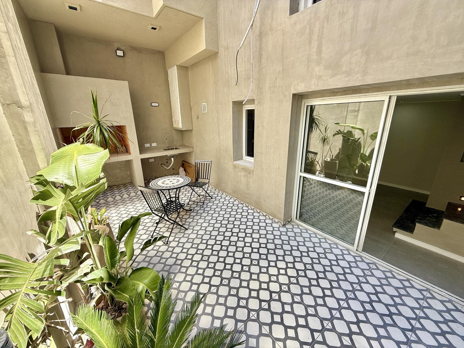 2-bedroom house on the street with a garage