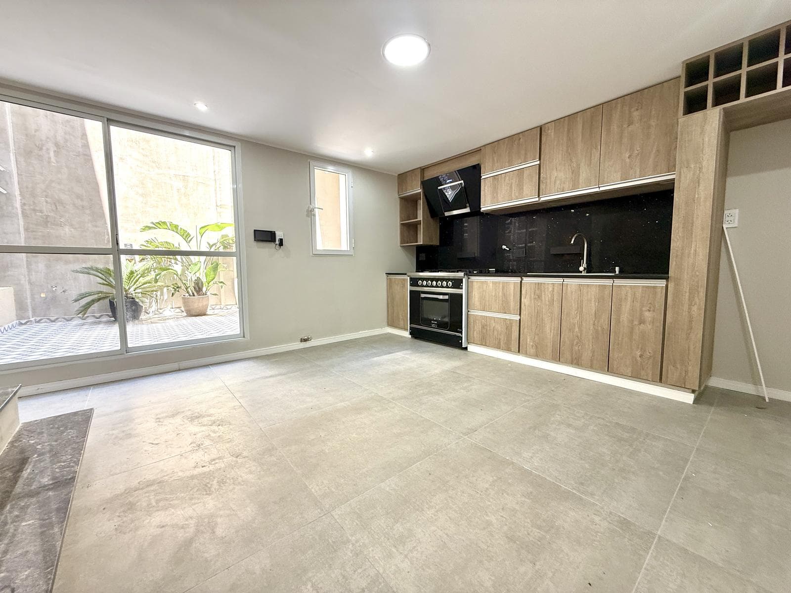 2-bedroom house on the street with a garage