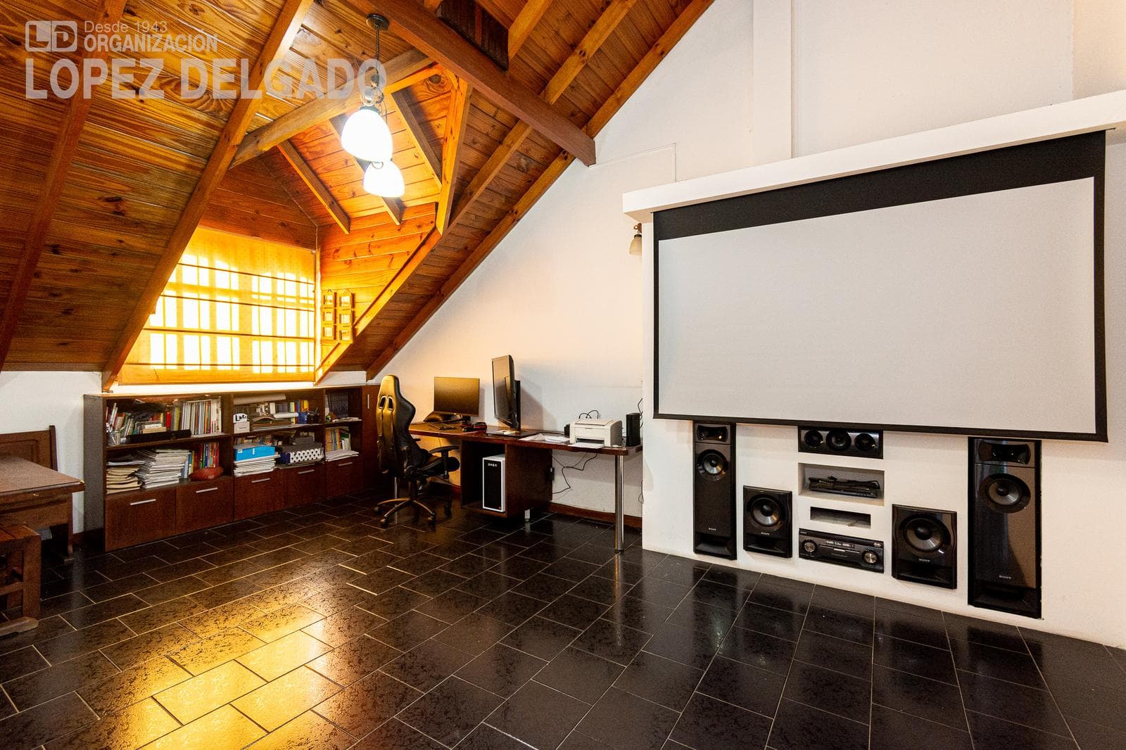House with a patio, pool, and playroom. 2-car garage.