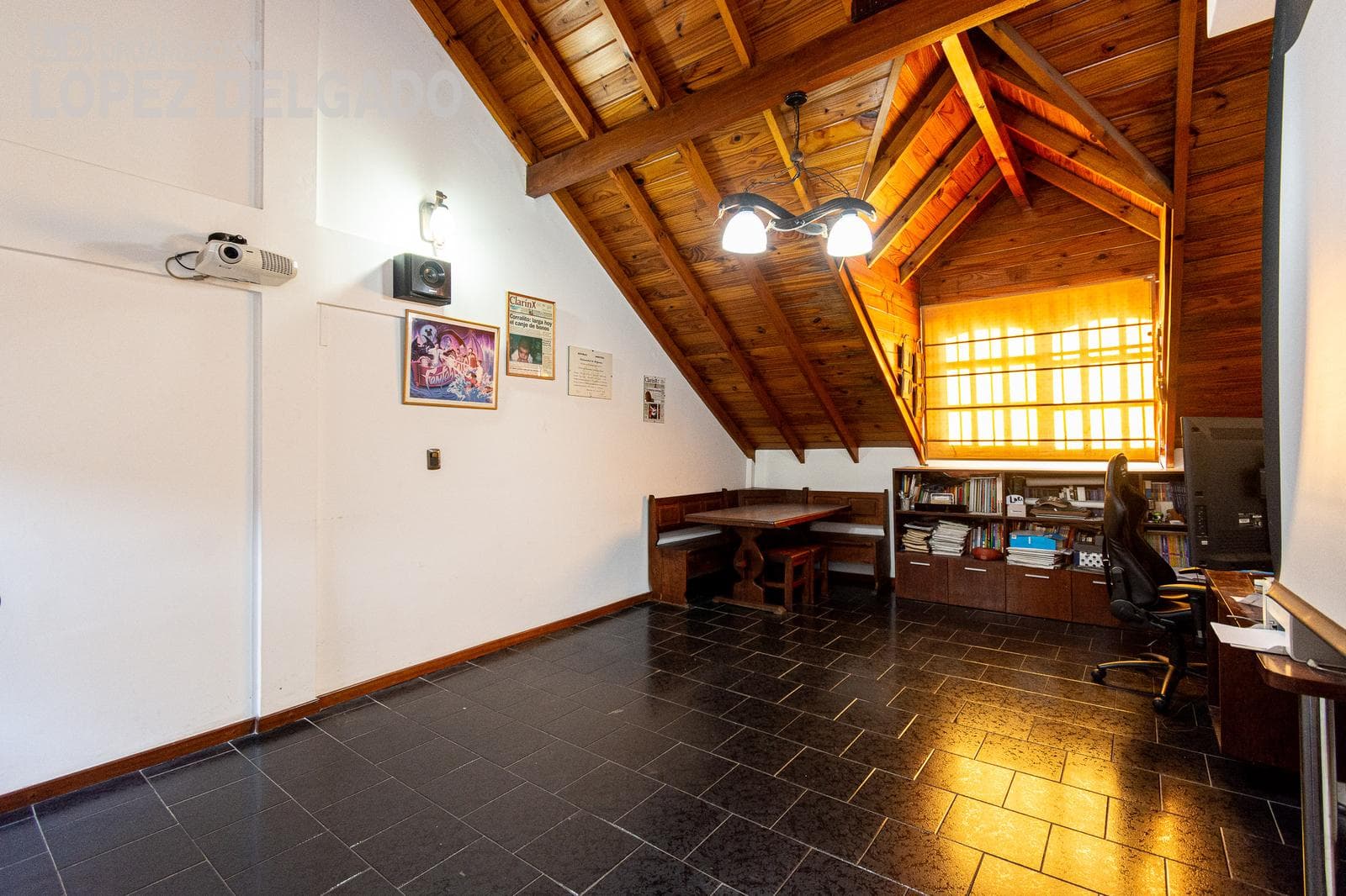House with a patio, pool, and playroom. 2-car garage.