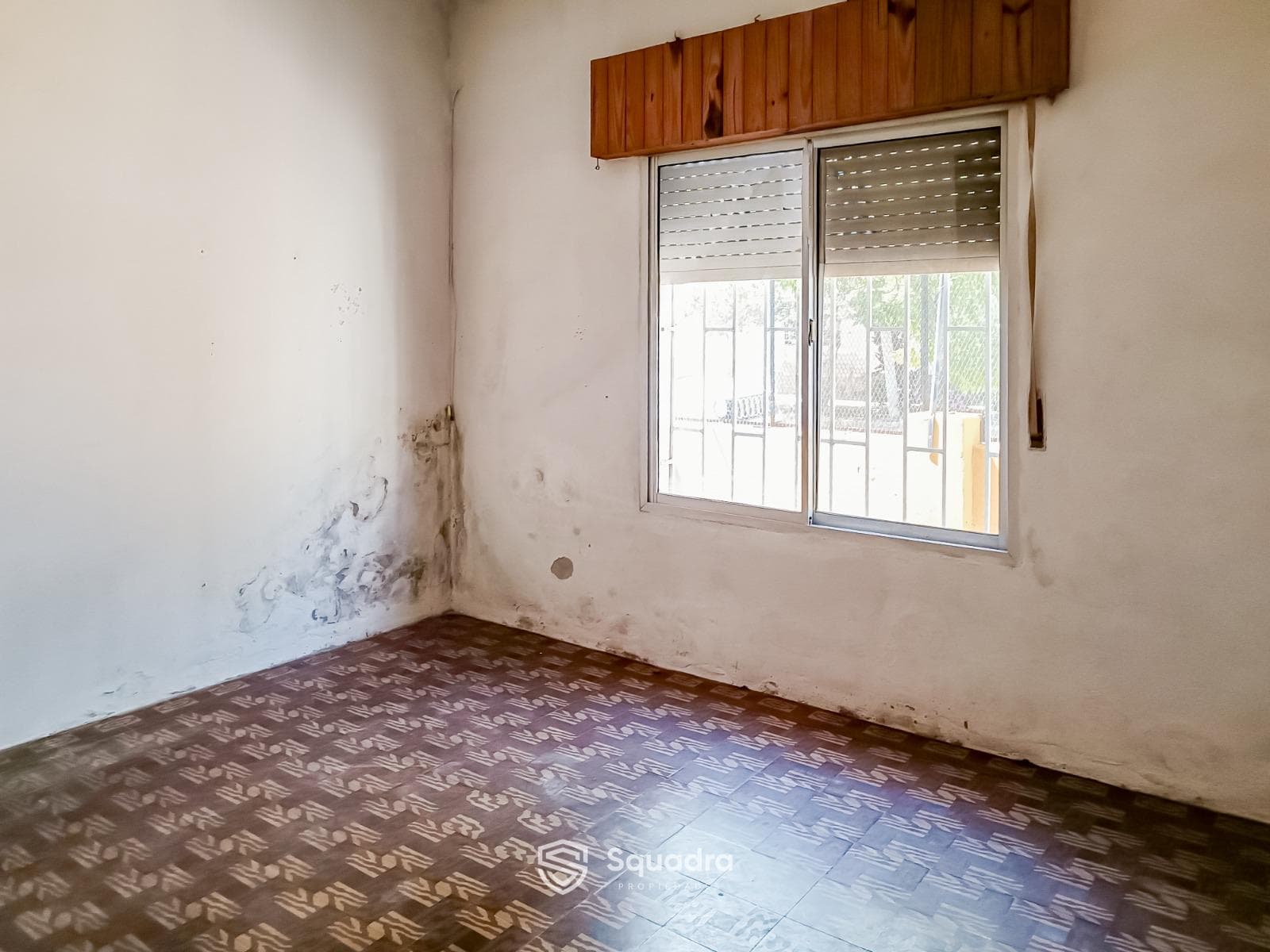 FOR SALE - 2-bedroom house with a patio and garage - Tiro Suizo, Rosario. QUALIFIES FOR A MORTGAGE.