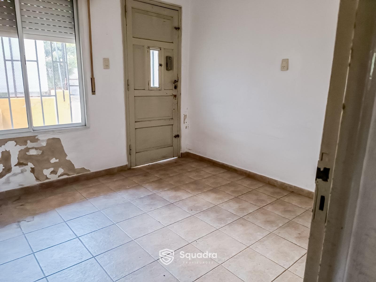 FOR SALE - 2-bedroom house with a patio and garage - Tiro Suizo, Rosario. QUALIFIES FOR A MORTGAGE.